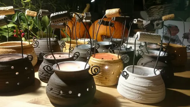 Lit pots on a garden table